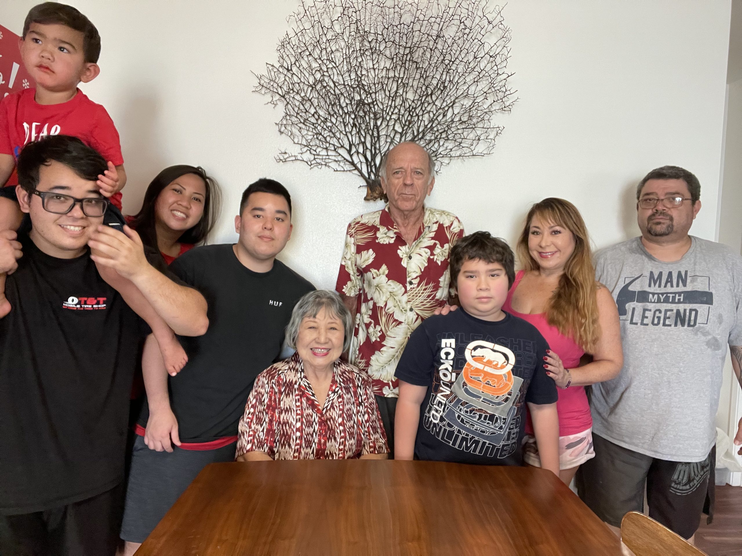 Teruko Dent creates a happy family through her Buddhist practice despite facing tremendous challenges. “I decided to fight for our family and transform the situation,” she said. Mrs. Dent pictured with her husband, Von, children and their families.