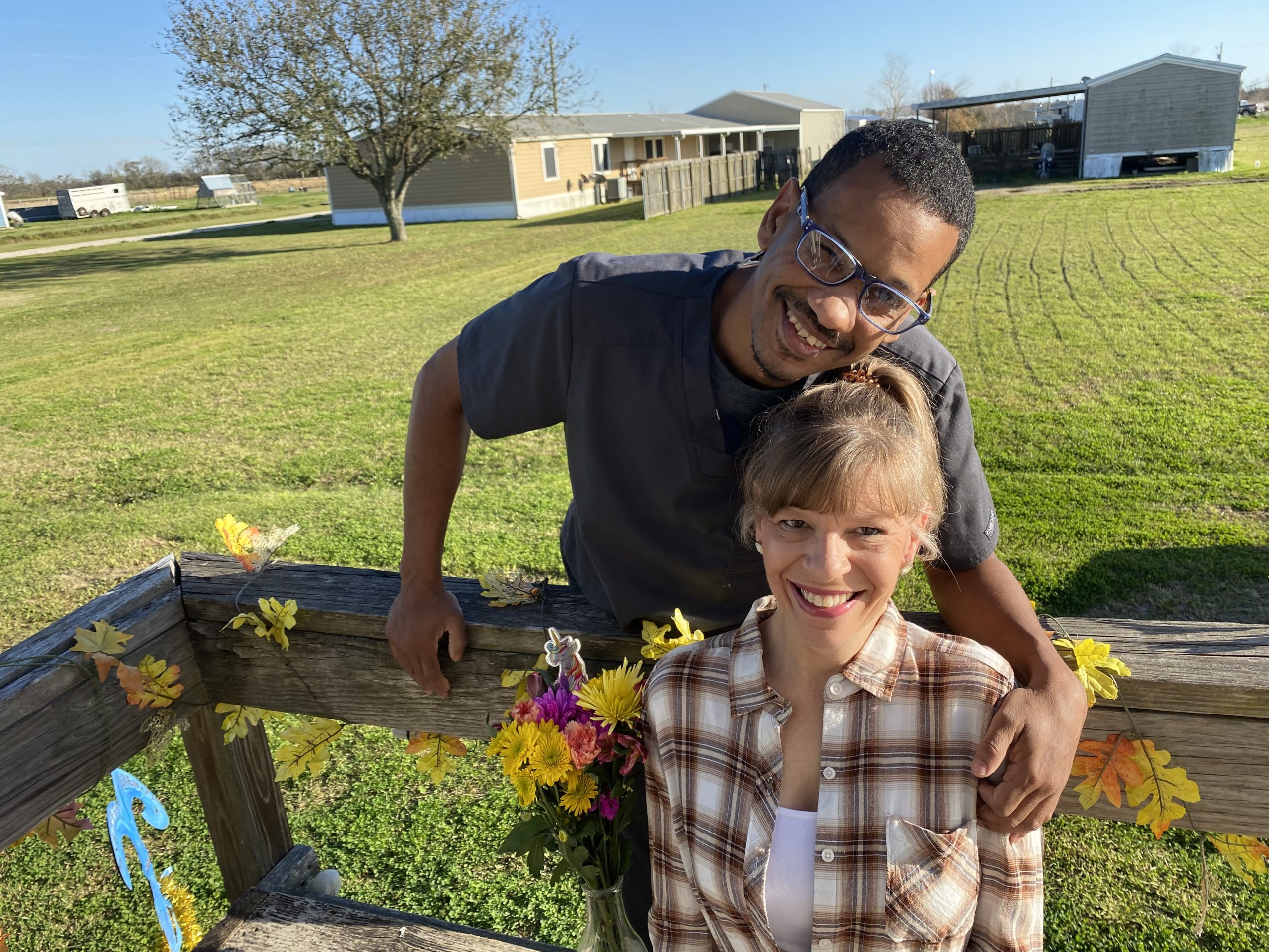 DeJohn Scott and his girlfriend, Christa, in front of the property they purchased in 2020.